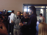 Bily Mitchell,Walter Day either side of Nick Hutt (Jamma+) after his Space Harrier world record score-Classic Gaming Expo 2005 in London